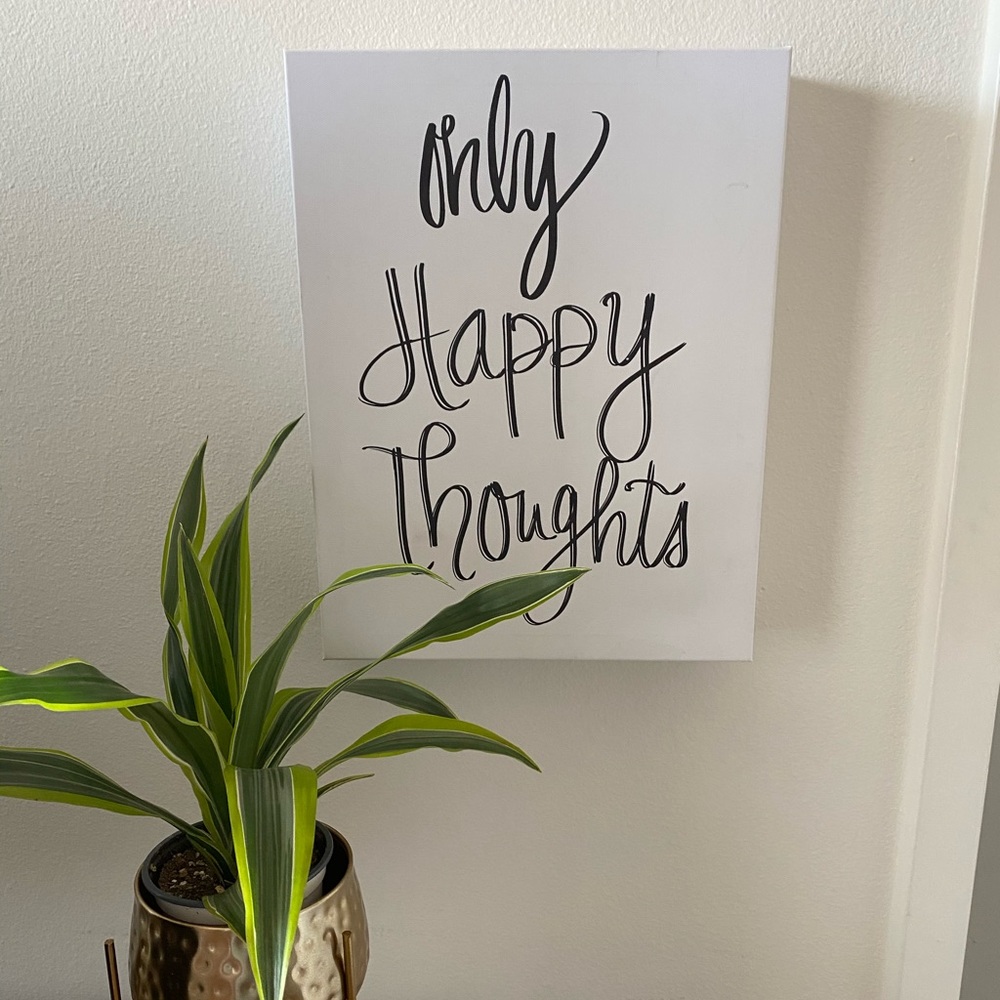 "Only happy thoughts" black and white canvas.